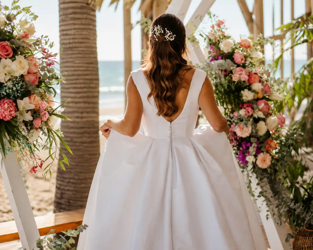 Bride walking through floral décor
